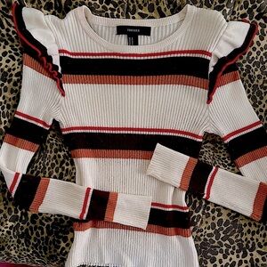 Ruffle Sweater with Retro Stripes.
